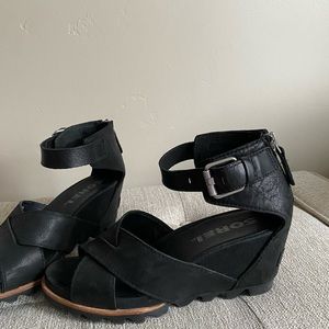 Sorel Women’s Joanie Ii Ankle Strap Wedge Sandal in Black